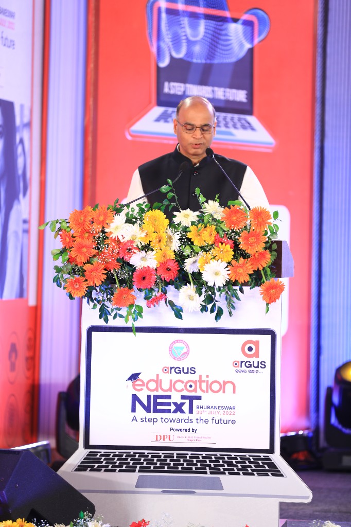 Speaker at the laptop-themed podium, Argus Education Next, 30 July 2022