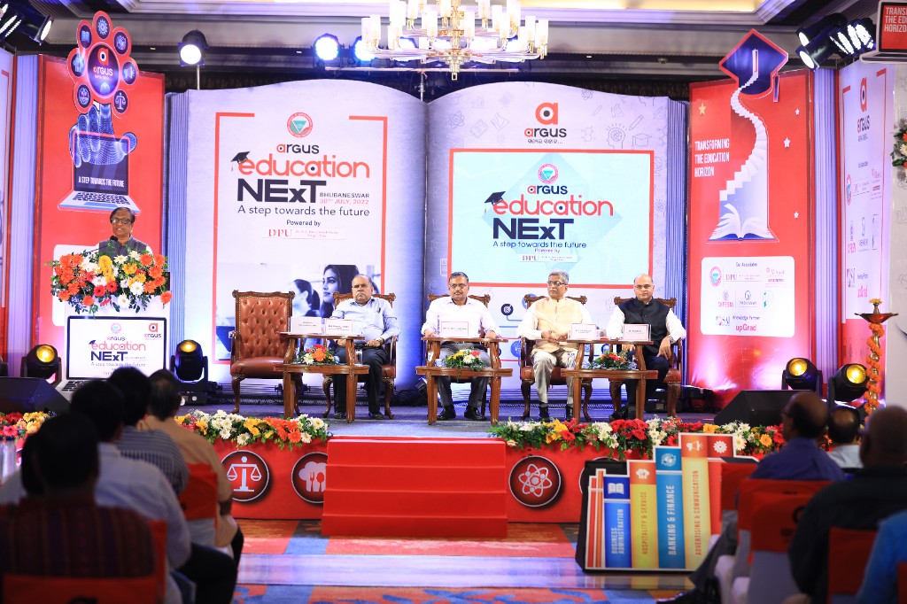 Panel session with speakers on stage, Bhubaneswar, 30 July 2022