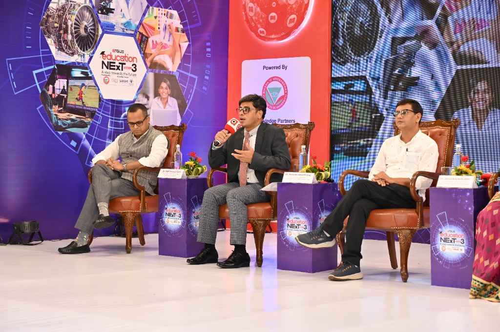 Expert panel at Season 3 with speakers at branded podiums