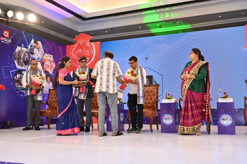 Award and bouquet presentation on the Education Next Season 3 stage