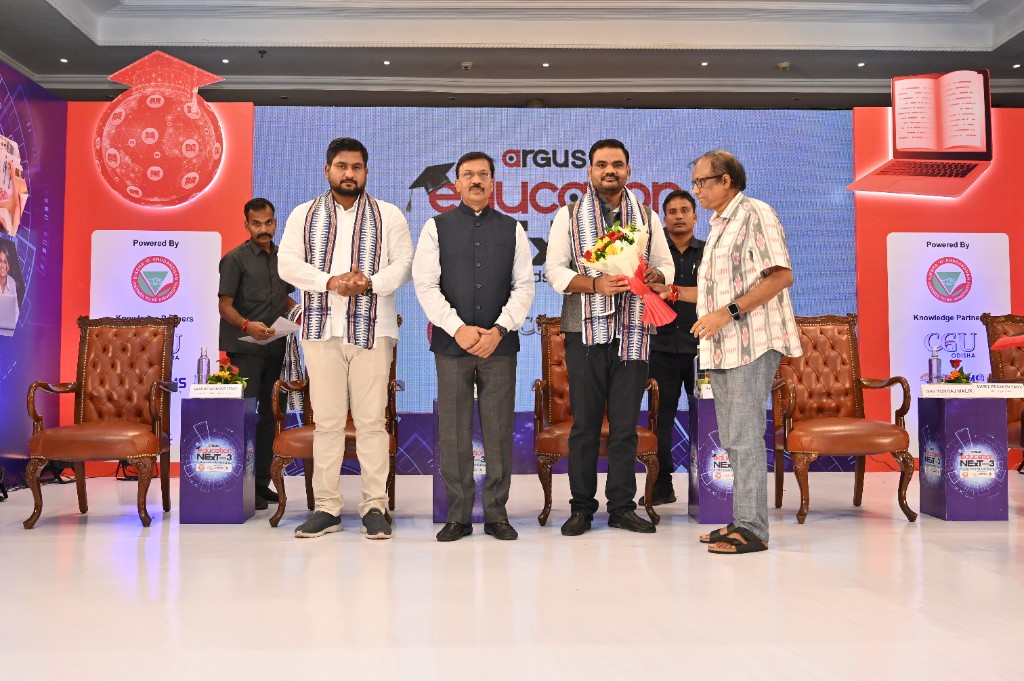 Felicitation with bouquet on the Education Next Season 3 stage